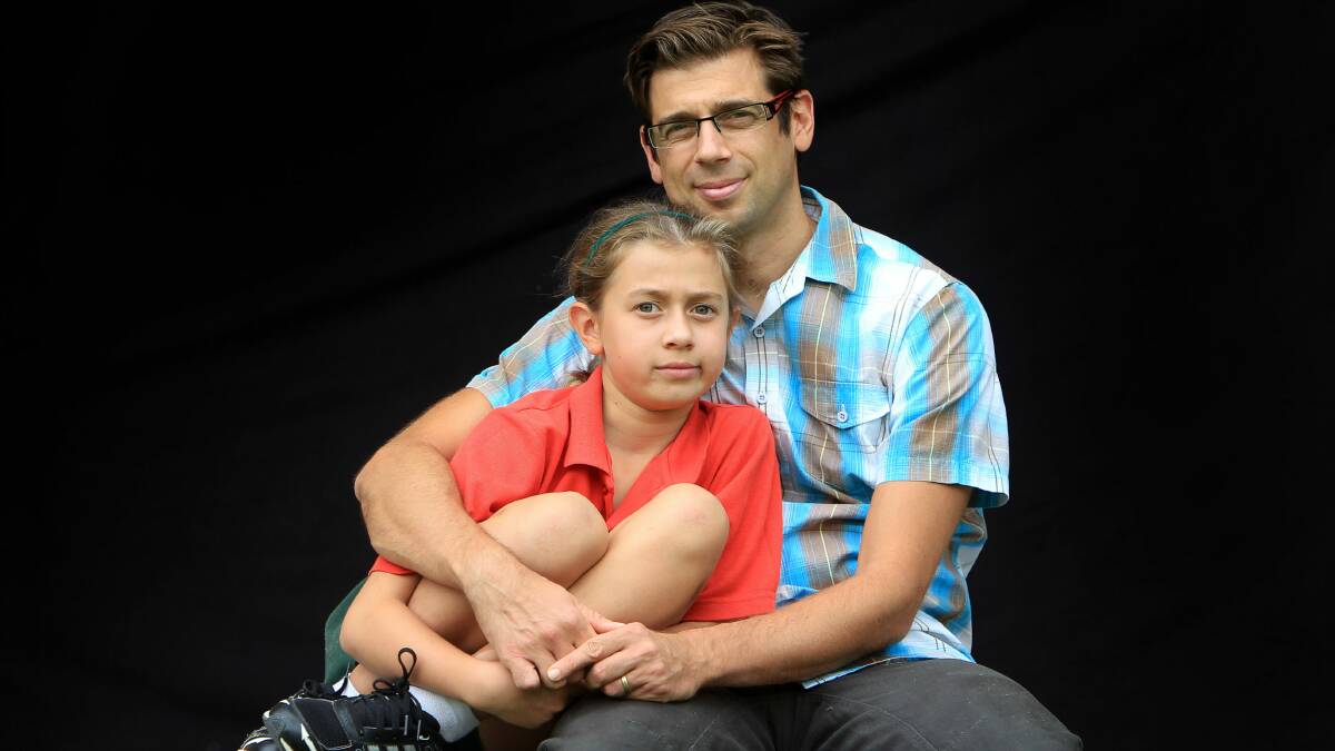Justin Coulson with his daughter Ella, 9. Picture: SYLVIA LIBER