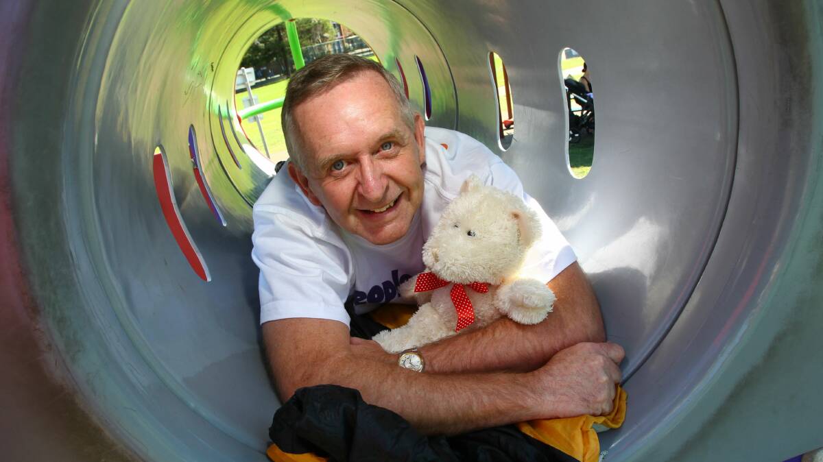 Dale Cairney of Peoplecare is the lead bidder for the penthouse apartment, the playground tube. Pictures: KEN ROBERTSON