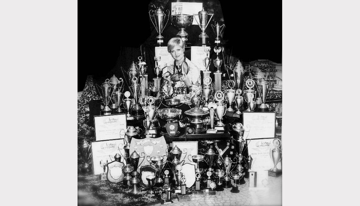 Australia’s First Lady of Hairdressing surrounded by some  of the hundreds of trophies she collected as one of the world’s great stylists.