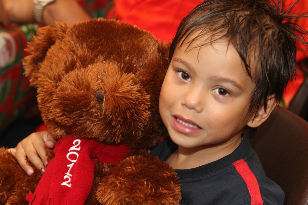 Thomas, 4, with his teddy bear.