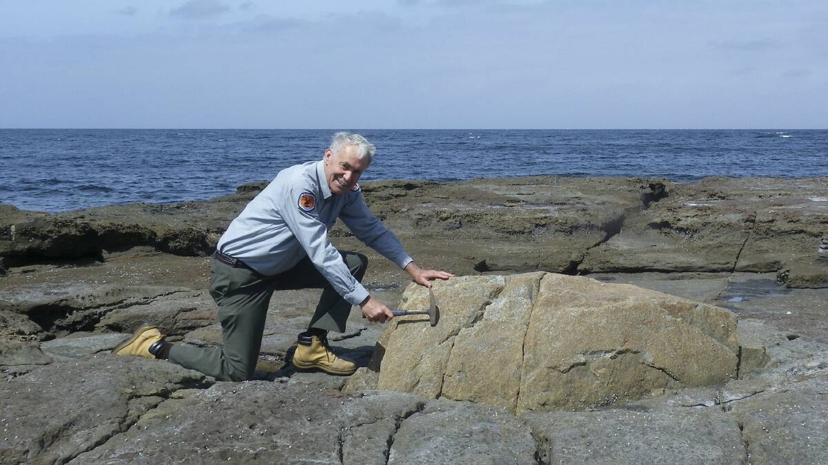  Discovery ranger and geologist Phil Smart on the silt stone rock platform at Ulladulla (North Head).