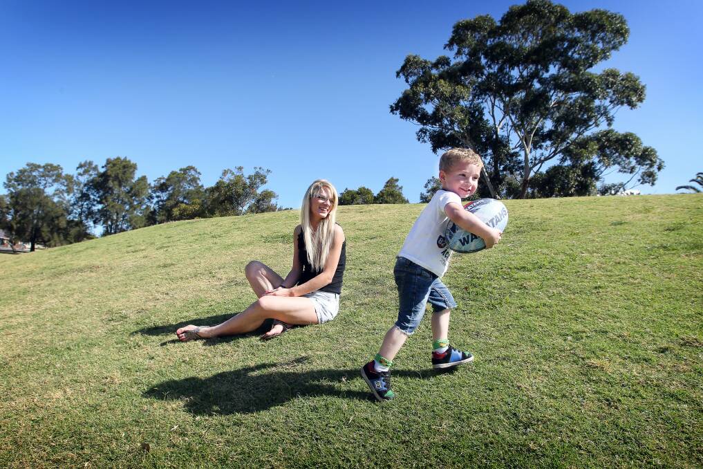Wollongong mum Kara Manley playing with her son Kyran Lea, 3, in MacCabe Park yesterday. Picture: SYLVIA LIBER