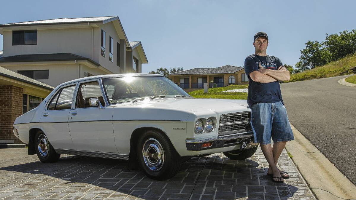 Lifelong Holden man Brad Lloyd with his lovingly restored 1973 HQ Premier. Picture: CHRISTOPHER CHAN