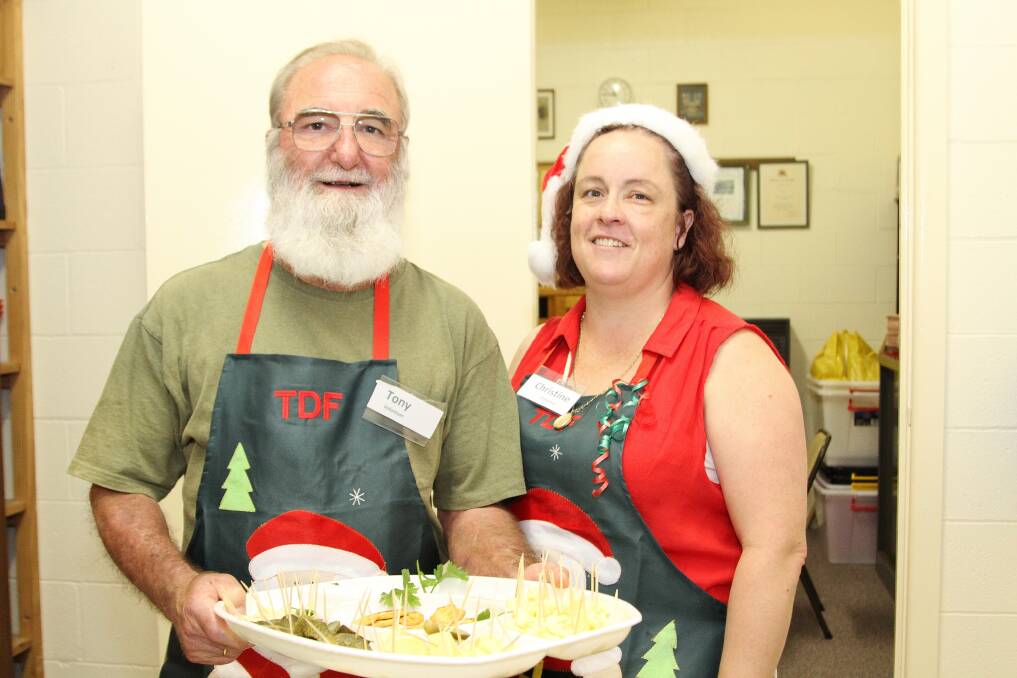 Tony Matthews and Christine Moon at the DENNY Foundation's Christmas Day lunch. Picture: GREG ELLIS