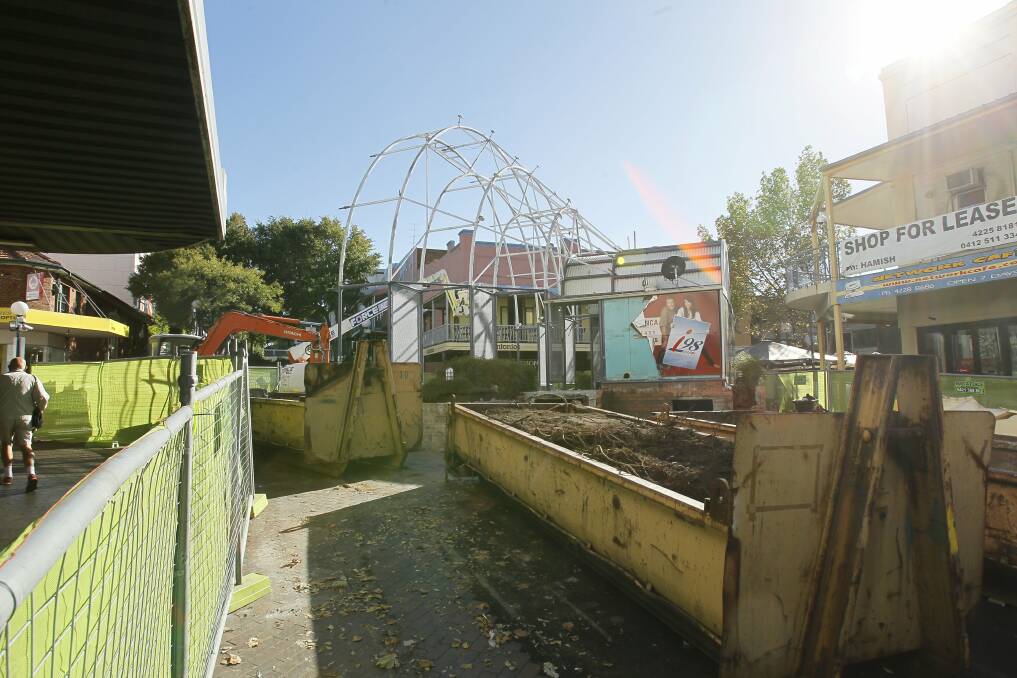 The dismantling of the ampitheatre. Pictures: SYLVIA LIBER, DAVE TEASE, KIRK GILMOUR