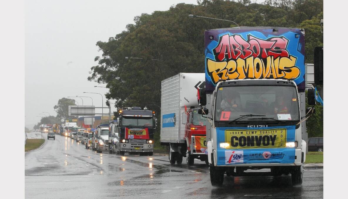 Trucks on Masters Road in Figtree for the 2013 i98FM Camp Quality Convoy for Kids. Picture: ADAM McLEAN