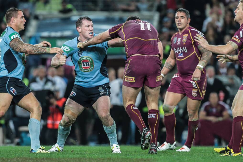 NSW skipper Paul Gallen and Maroons forward Nate Myles come to blows in the Origin opener on June 5. Picture: ADAM McLEAN