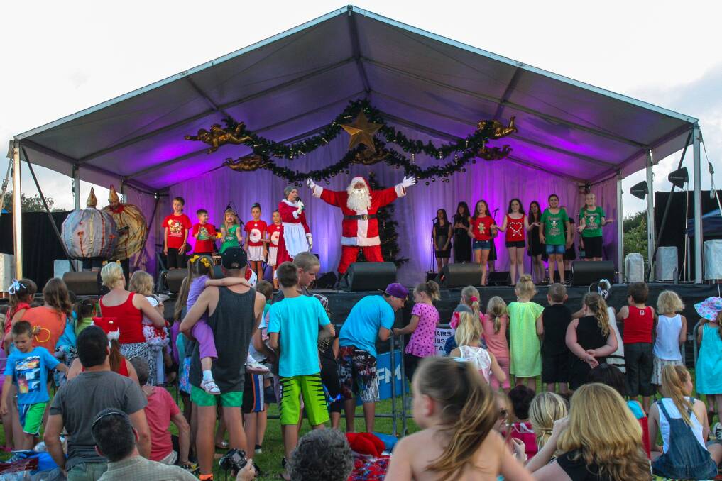 Santa and friends on stage at Reddall Reserve. Picture: ADAM McLEAN
