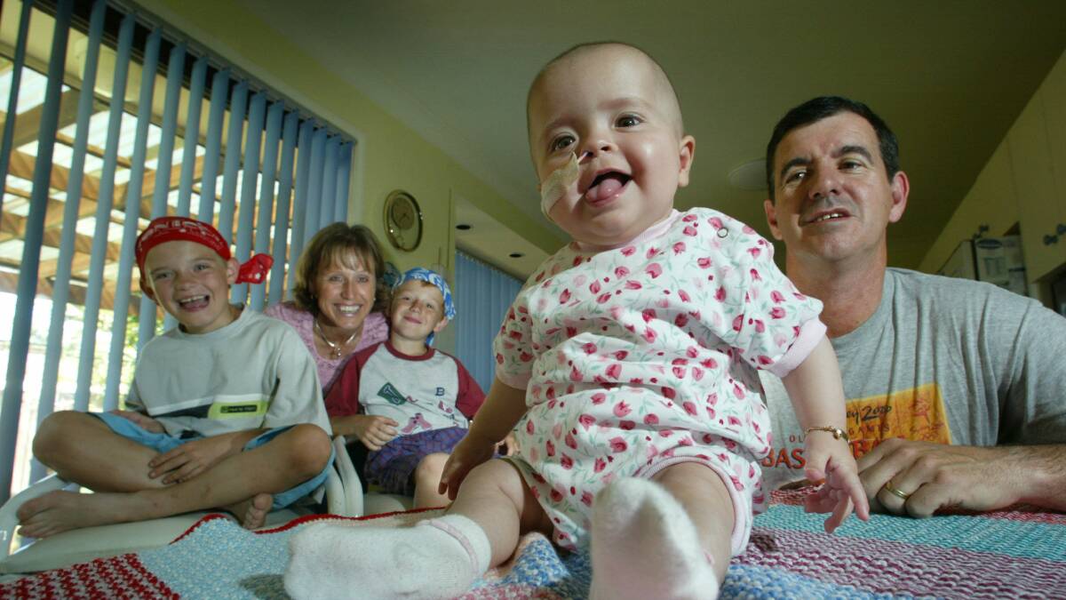 Horsley baby Teegan Marsh, Australia’s youngest stem cell patient at nine months, with her father Kevin, brothers Thomas, 8, and Dylan, 6, and mum Christine.
