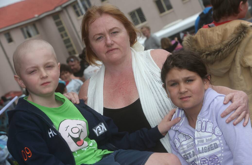 Di Young, pictured with son Matthew, 9, and Chloe Scott, 12. Picture: ROBERT PEET