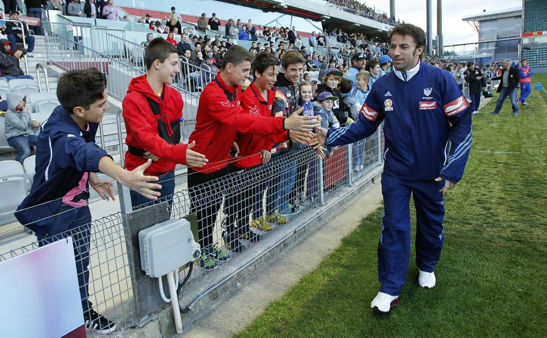 Del Piero shakes hands with his fans at WIN stadium. 