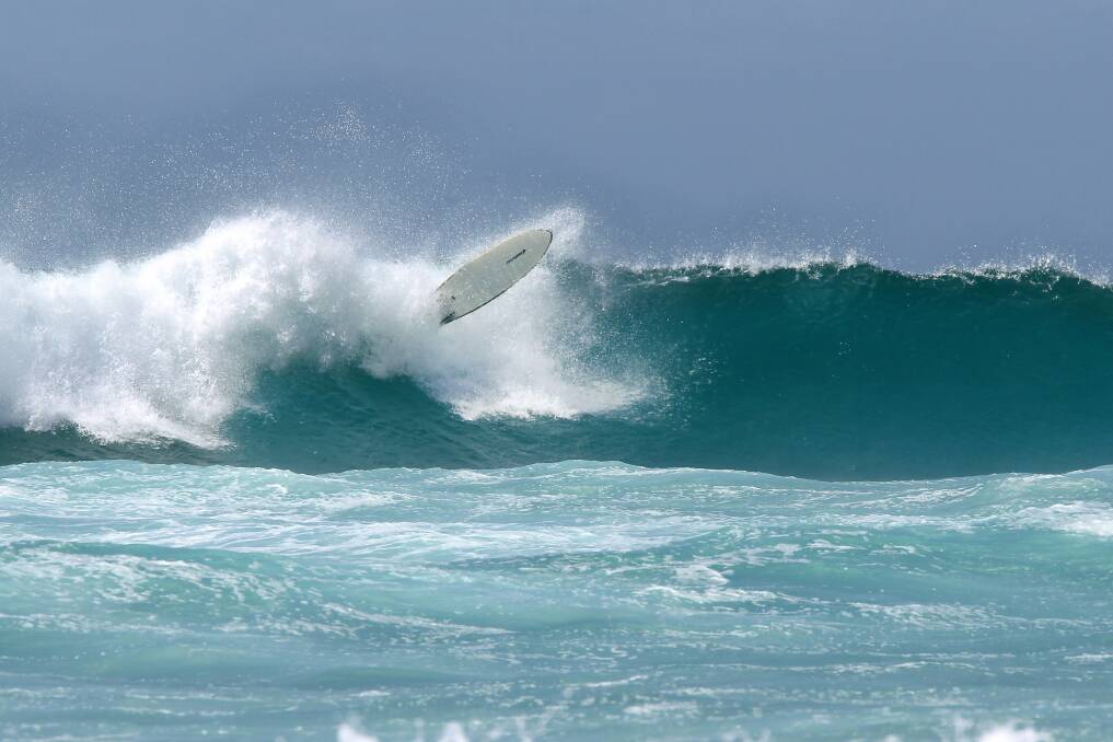 Surfers take advantage of big swell at The Farm. Picture: SYLVIA LIBER