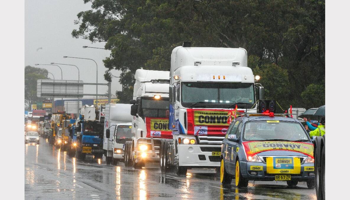 Trucks on Mt Ousley Road for the 2013 i98FM Camp Quality Convoy for Kids. Picture: ADAM McLEAN