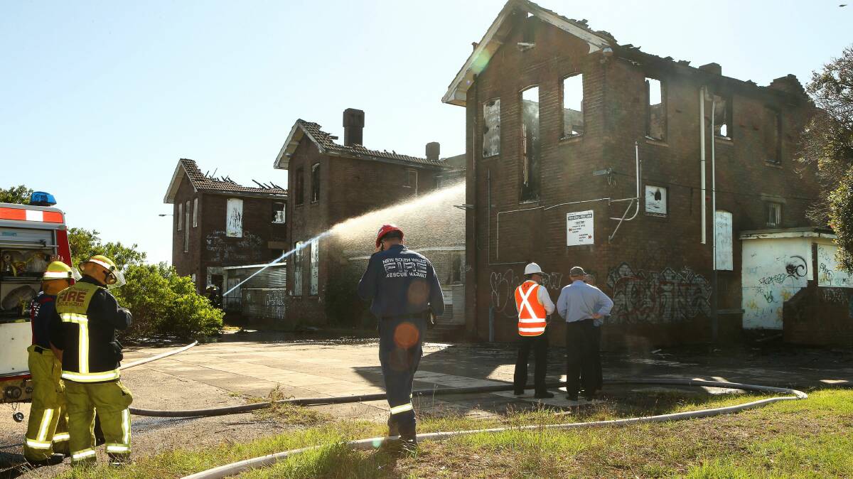 Fire crews house down the school on Friday morning. Picture: KIRK GILMOUR 