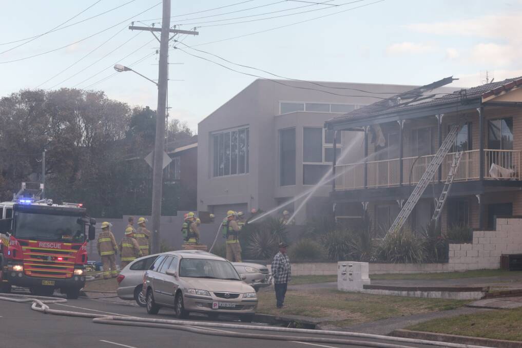 PHOTOS: Dragons comfort Beau Ryan’s dad after house fire