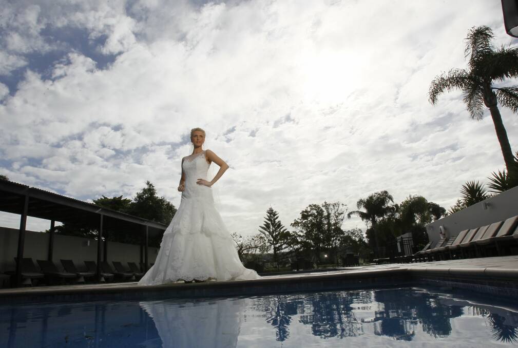 Mia Agius models a much-coveted Alfred Angelo dress at the Mercure Resort Gerringong by the Sea. Picture: DAVE TEASE