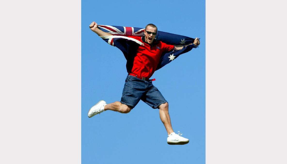 Glen Saville draped in an Australian flag.