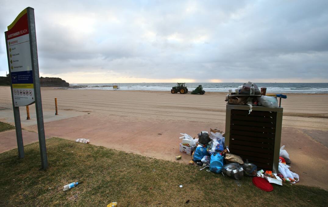 Council clean-up crews were kept busy yesterday after New Year’s Day crowds along Wollongong’s foreshore. KIRK GILMOUR