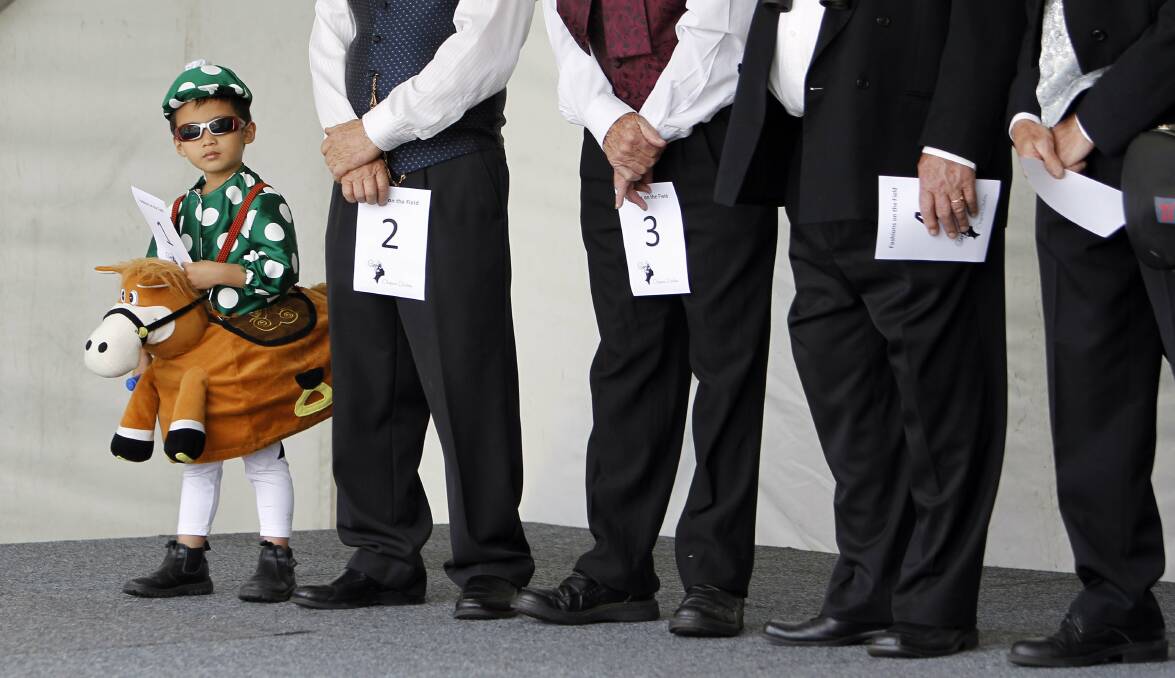 Nick, 4, competes in the men's fashion competition at Kembla Grange in October. Picture: ANDY ZAKELI
