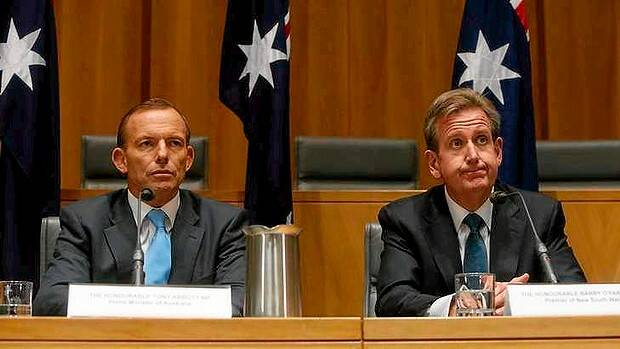 Prime Minister Tony Abbott with NSW Premier Barry O'Farrell during the COAG press conference. Picture: ANDREW MEARES