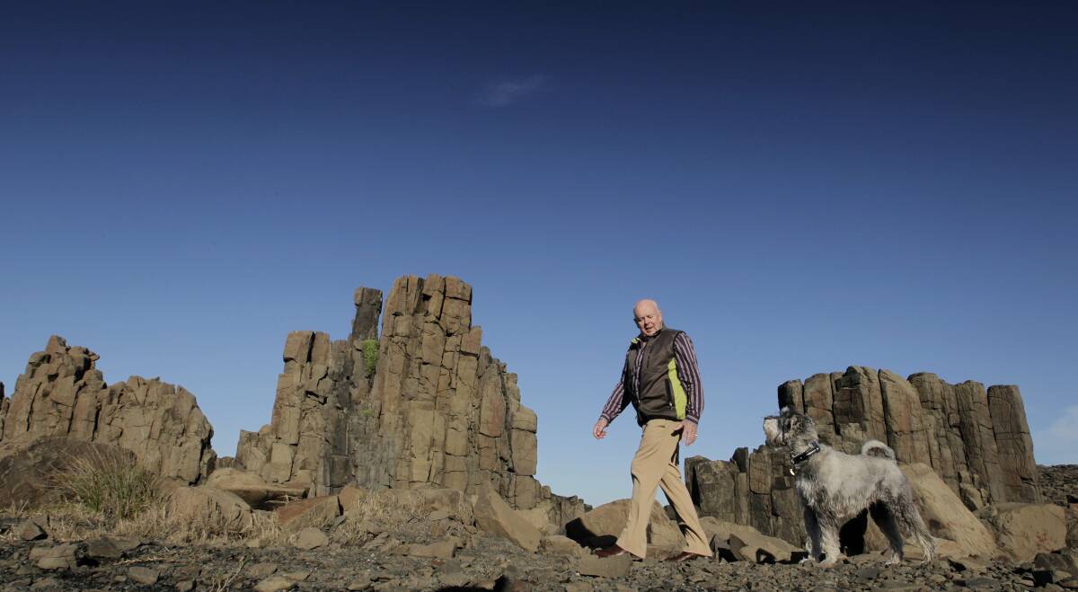  Kiama Councillor Warren Steel and his dog Jazz at old Bombo quarry site.