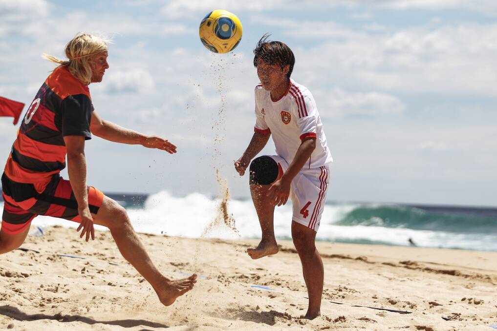 China plays Wollongong in a beach soccer friendly at North Beach. Picture: CHRISTOPHER CHAN