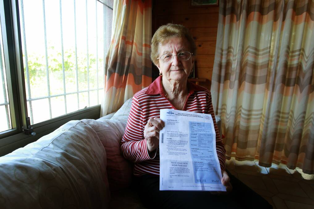 Severina Beccari with a renewal notice from the NRMA. Picture: SYLVIA LIBER