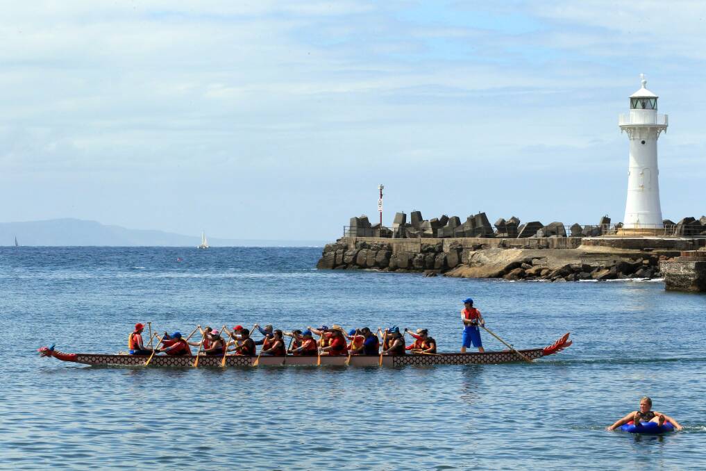 Dragon boating in Wollongong Harbour. Picture: ORLANDO CHIODO