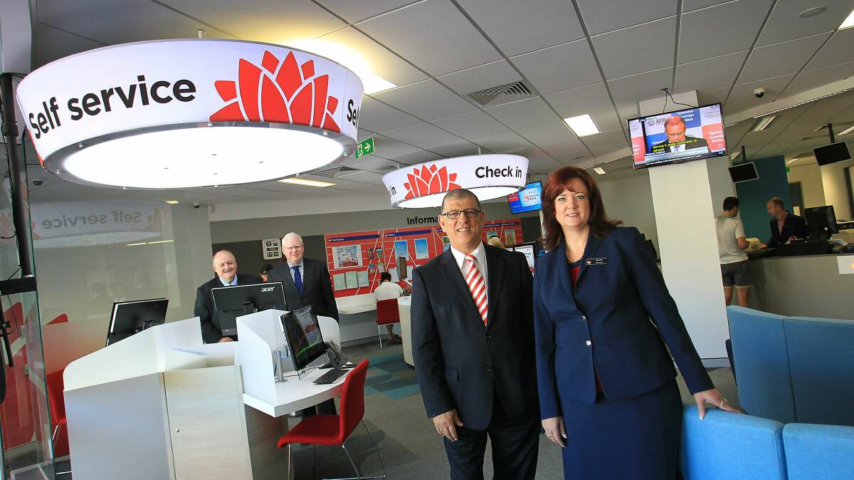 Heathcote MP Lee Evans, Kiama MP Gareth Ward, Minister for the Illawarra John Ajaka and Service NSW centre manager Penny Delangen. Picture: ORLANDO CHIODO