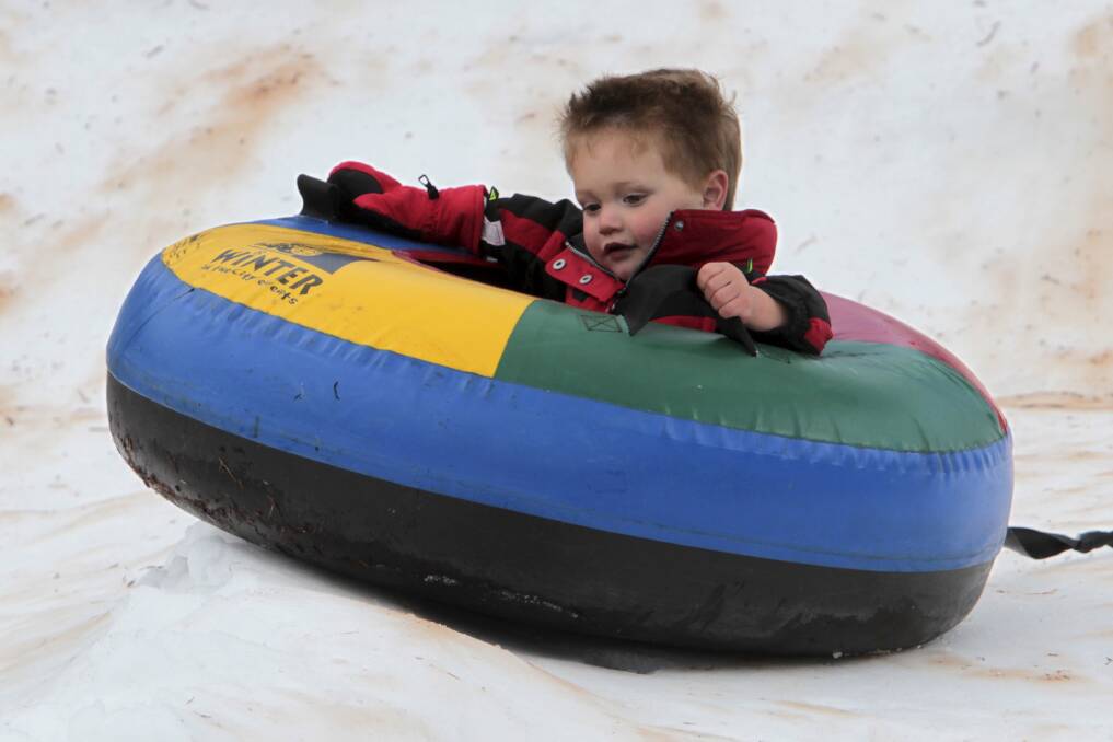 Snow tuber Louis, 2, at the Illawarra Fly in September. Picture: GREG TOTMAN