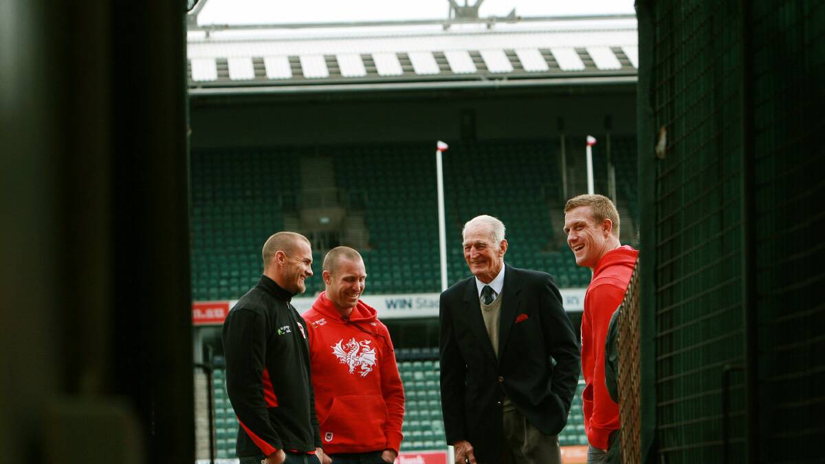 Norm Provan greets one-club Dragons stalwarts Matt Cooper, Ben Hornby and Ben Creagh at training. Pictures: SYLVIA LIBER