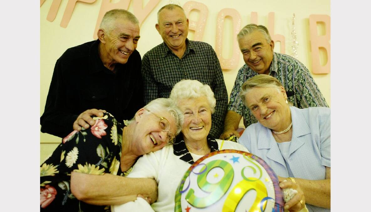 Mrs McGuire celebrates her 90th birthday at Figtree Community Hall with daughters Valma Weigand (left) and Hazel Piper, and sons Allan, John and David McGuire.