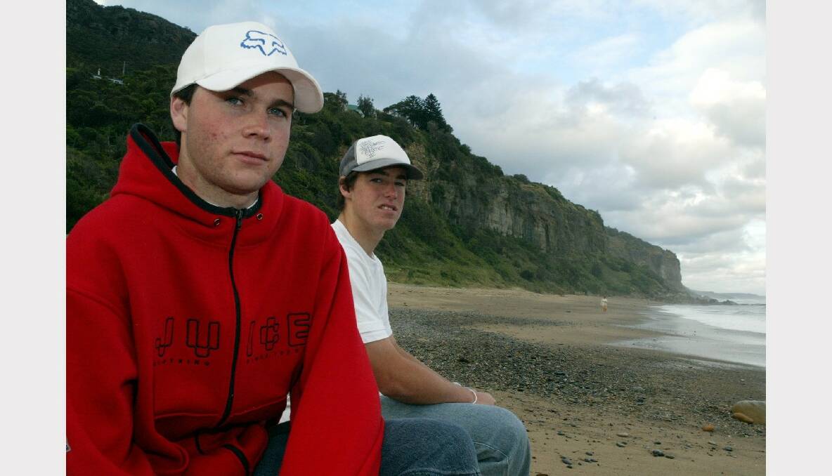 Michael Jordan (right) jumped into rough seas to save Nathan Townsend at Coalcliff.