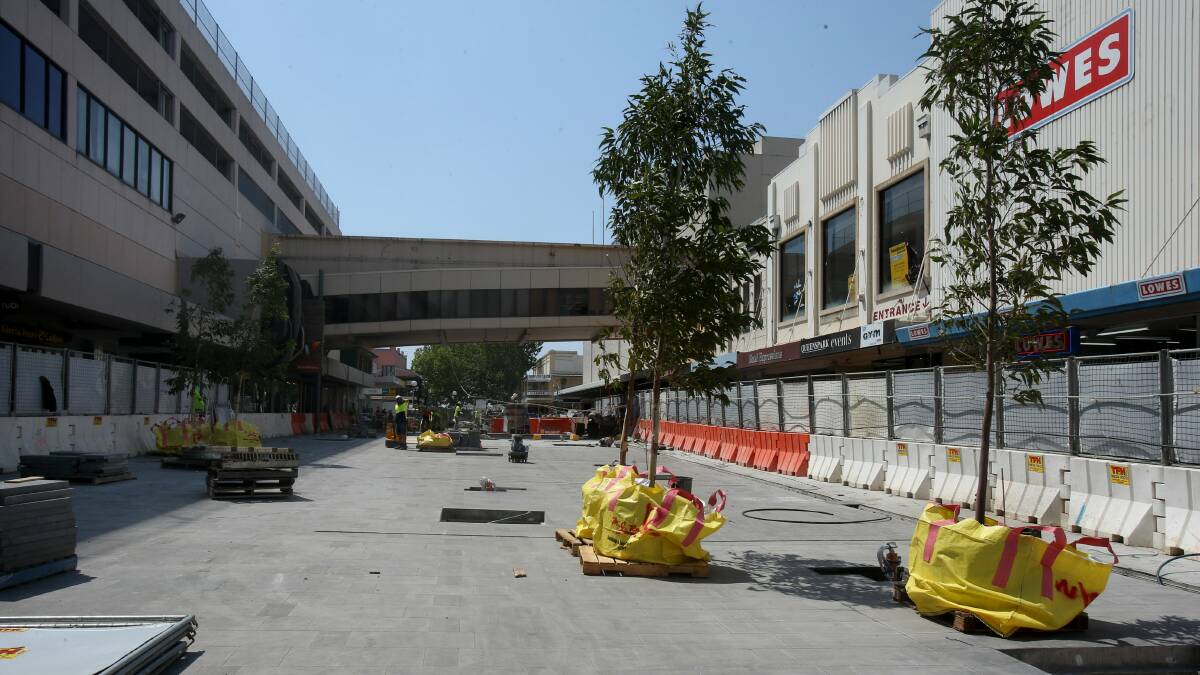 The planting of spotted gum trees in Crown Street Mall has created a stir. Picture: ROBERT PEET