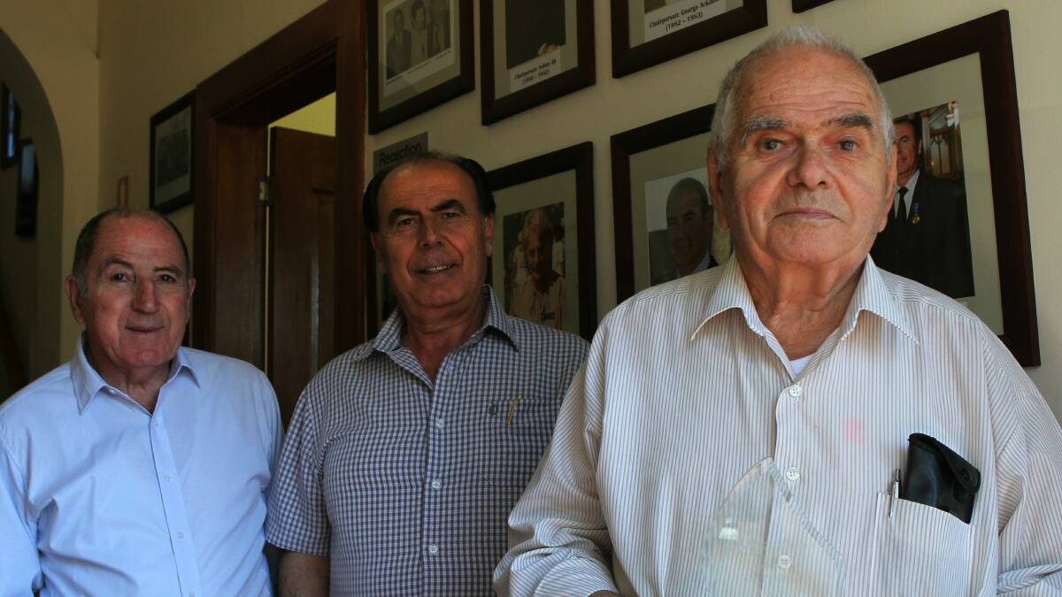 George Bartolo and Ken Habak with John Papakosmas (right). Picture: GREG TOTMAN