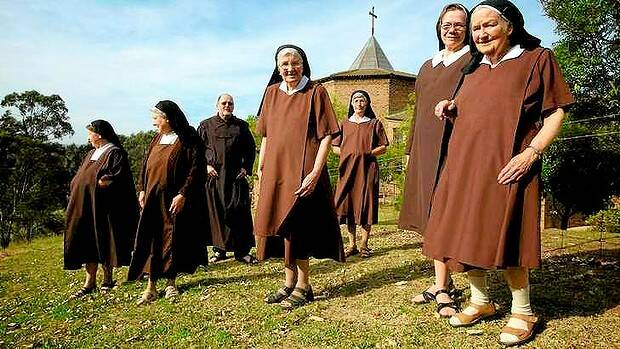 Discalced Carmelite nuns and Father Greg Burke at their Varroville monastery. Photo: Wolter Peeters