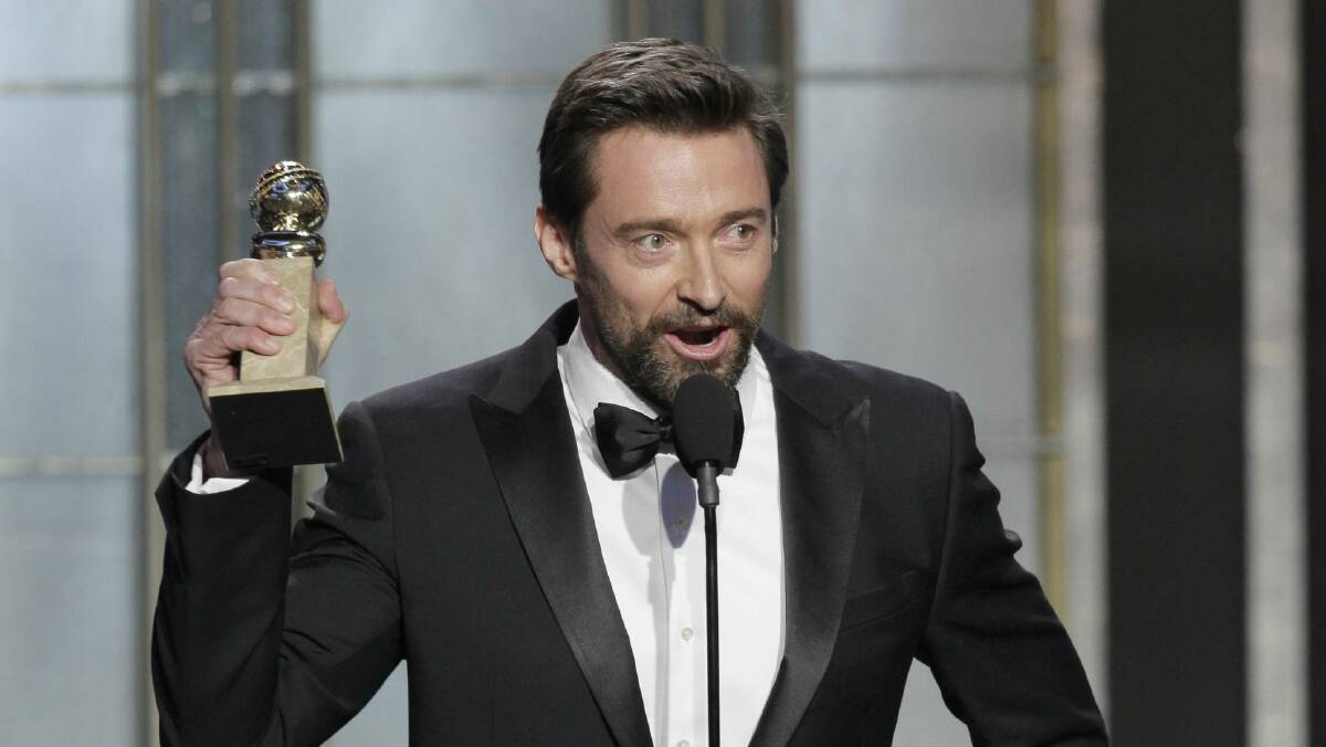 Hugh Jackman accepts his Golden Globe. Picture: GETTY IMAGES