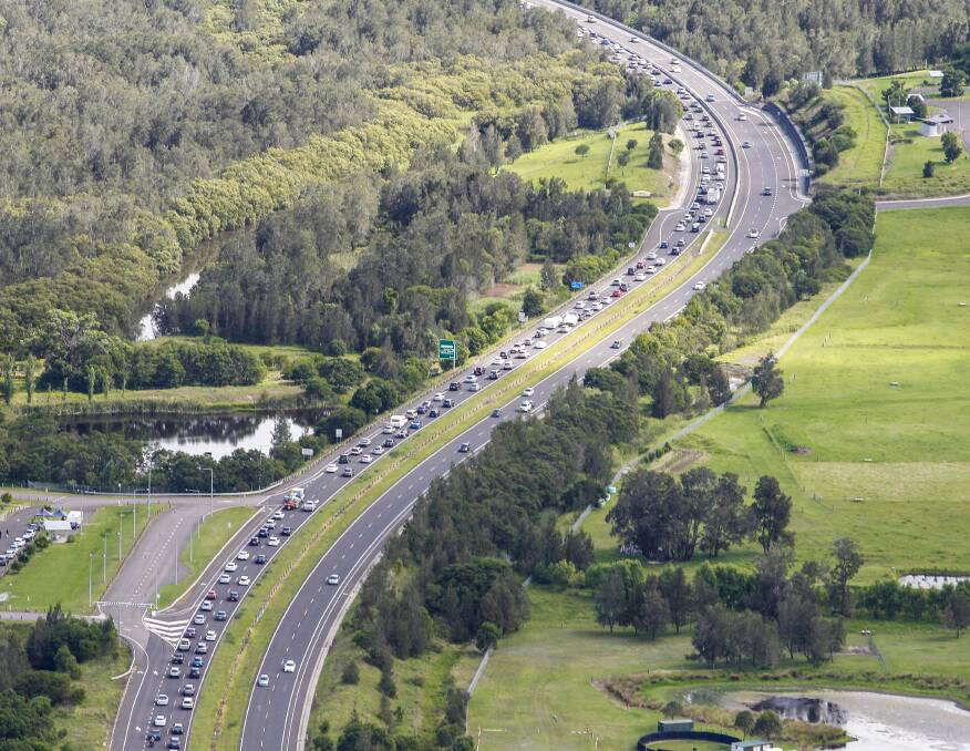 Holiday traffic heading south near Kiama yesterday. Picture: CHRISTOPHER CHAN