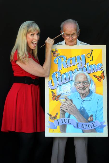 Melissa Ritchie and her grandfather-in-law Ray Large, with the portrait. Picture: SYLVIA LIBER