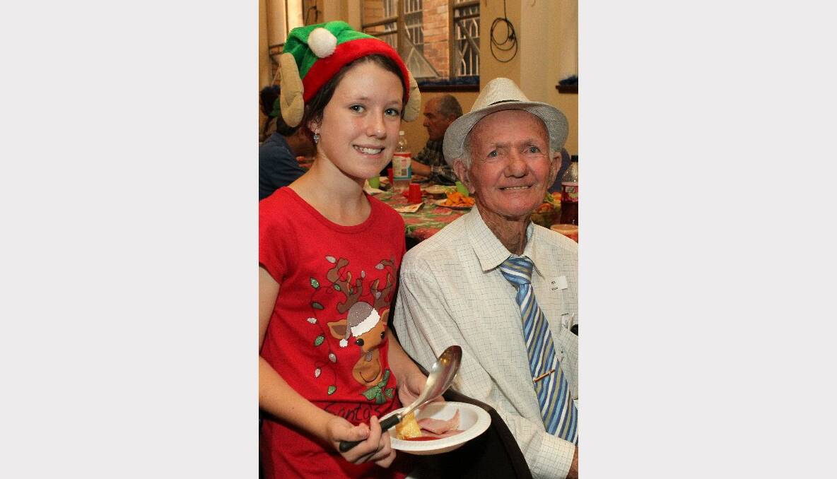 Max McLeod, 84, is served Christmas lunch by Sophie, 10.