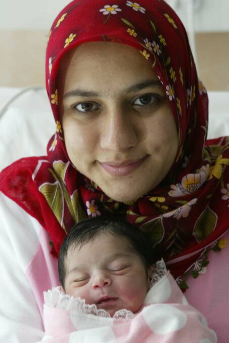 Nejla Gunes from Cringila with her newborn baby girl.