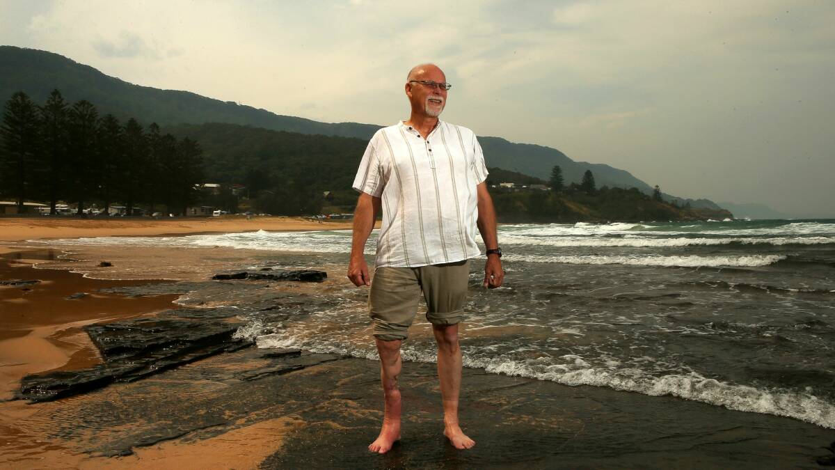 Ray Short looks out over the water at Coledale Beach, the scene of the shark attack. Pictures: KIRK GILMOUR
