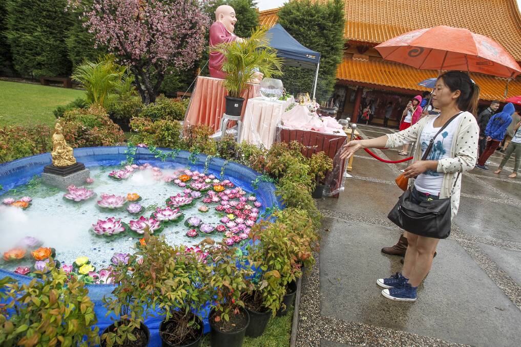 Visitors enjoy the sights of Nan Tien’s annual cultural festival. Picture: CHRISTOPHER CHAN