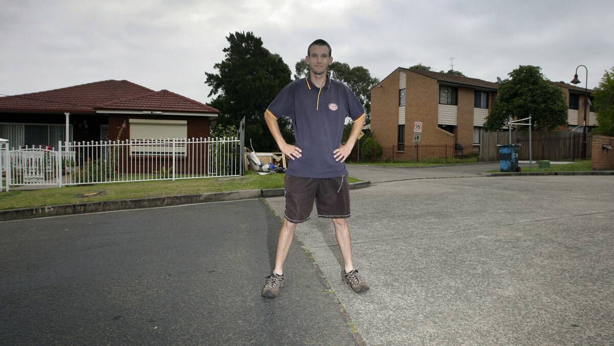 Alex Ross stands on a pseudo boundary that could see some property values rise by thousands of dollars. Picture: ANDY ZAKELI