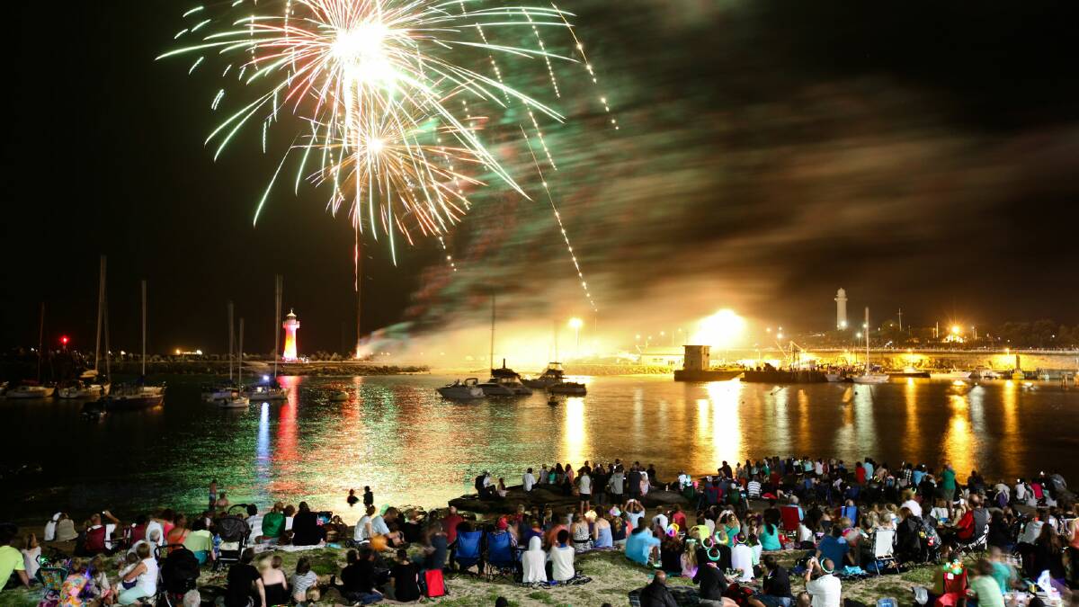 The crowd watches the fireworks at Belmore Basin. Picture: WARREN KEELAN