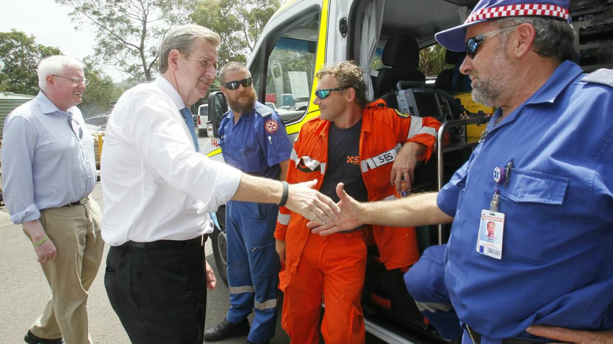 Several SES volunteers meet Premier Barry O'Farrell. Picture: DAVID TEASE