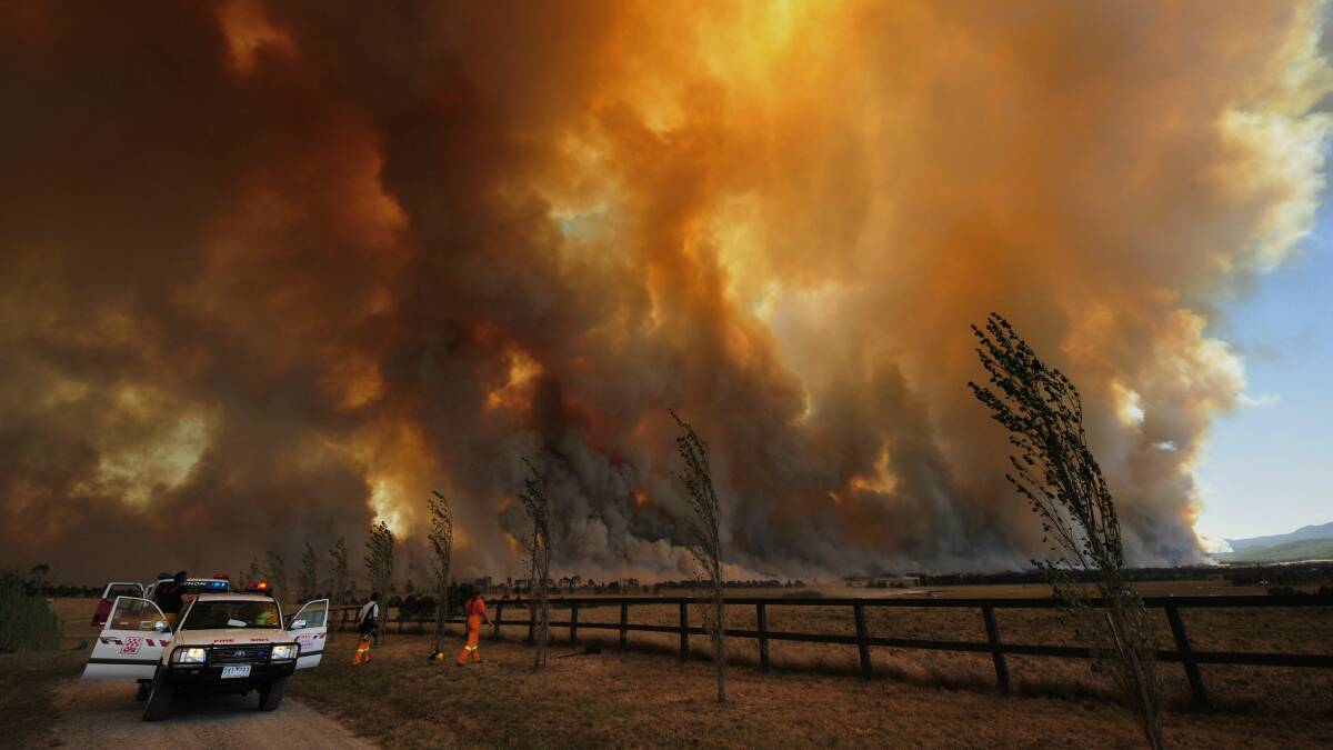 A bushfire rages out of control in Victoria on Black Saturday in 2009. Picture: Jason South