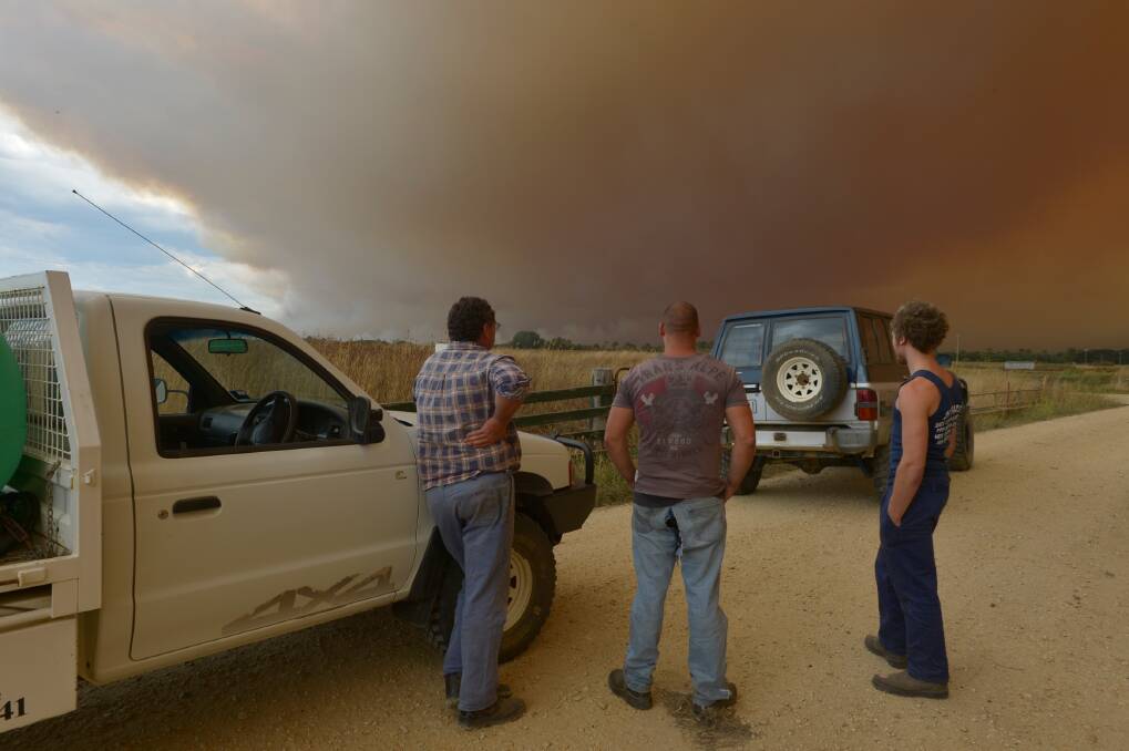 Cowwarr locals watch for embers near their property as fires burn in Gippsland. Photo: Michael Clayton-Jones