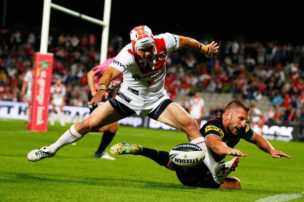 St George Illawarra's Jamie Soward and Penrith's Lewis Brown contest the ball in the Panthers' 19-0 win on Saturday night. Picture: GETTY IMAGES.