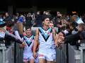 Port Adelaide captain Connor Rozee (c) is a certain starter against Adelaide. (James Ross/AAP PHOTOS)